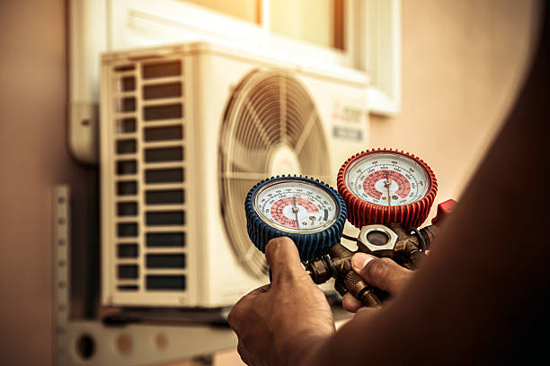 Professional Air Conditioning Service technician working in Lewistown, MT